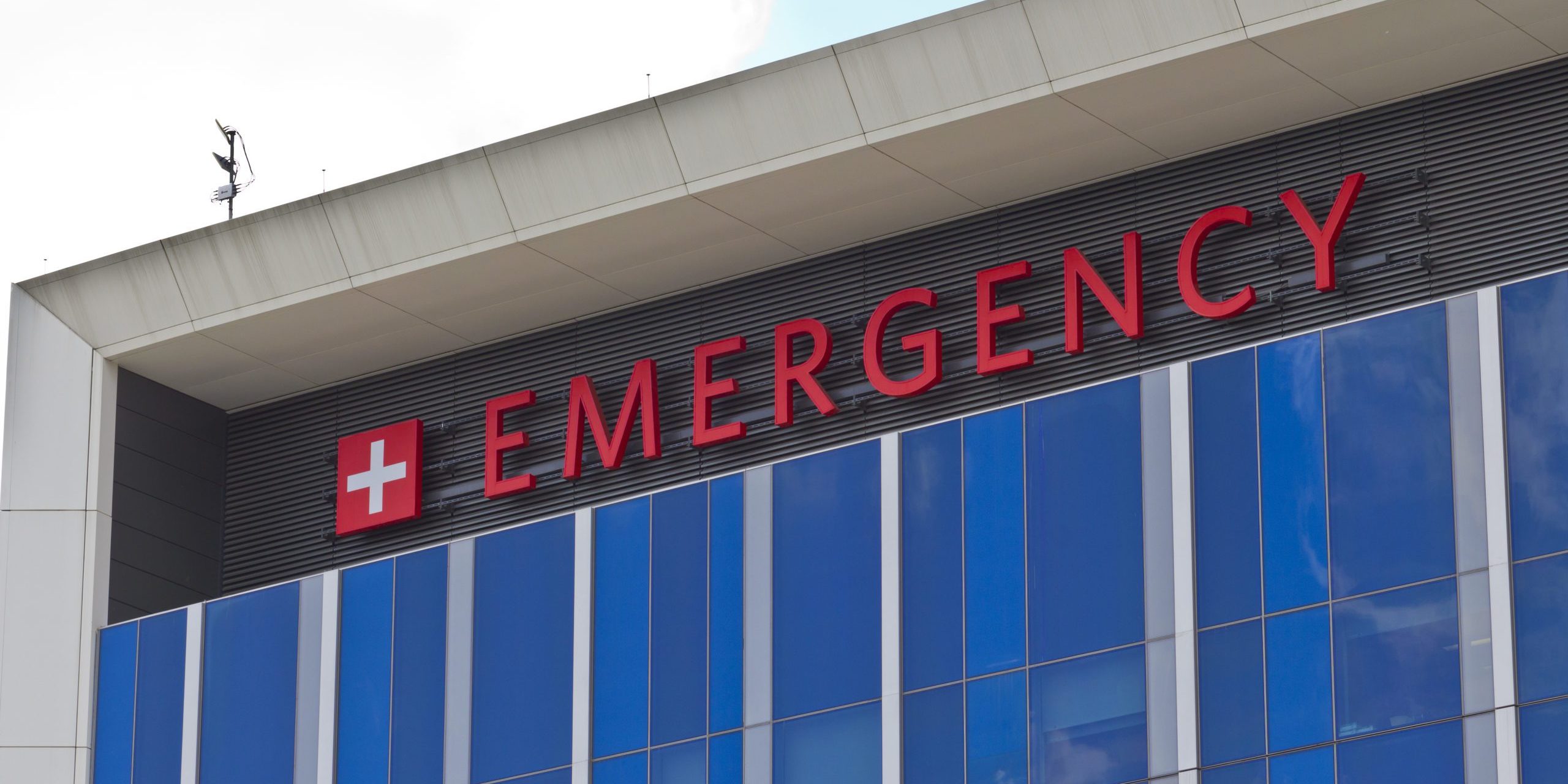 Red Emergency Entrance Sign for a Local Hospital V